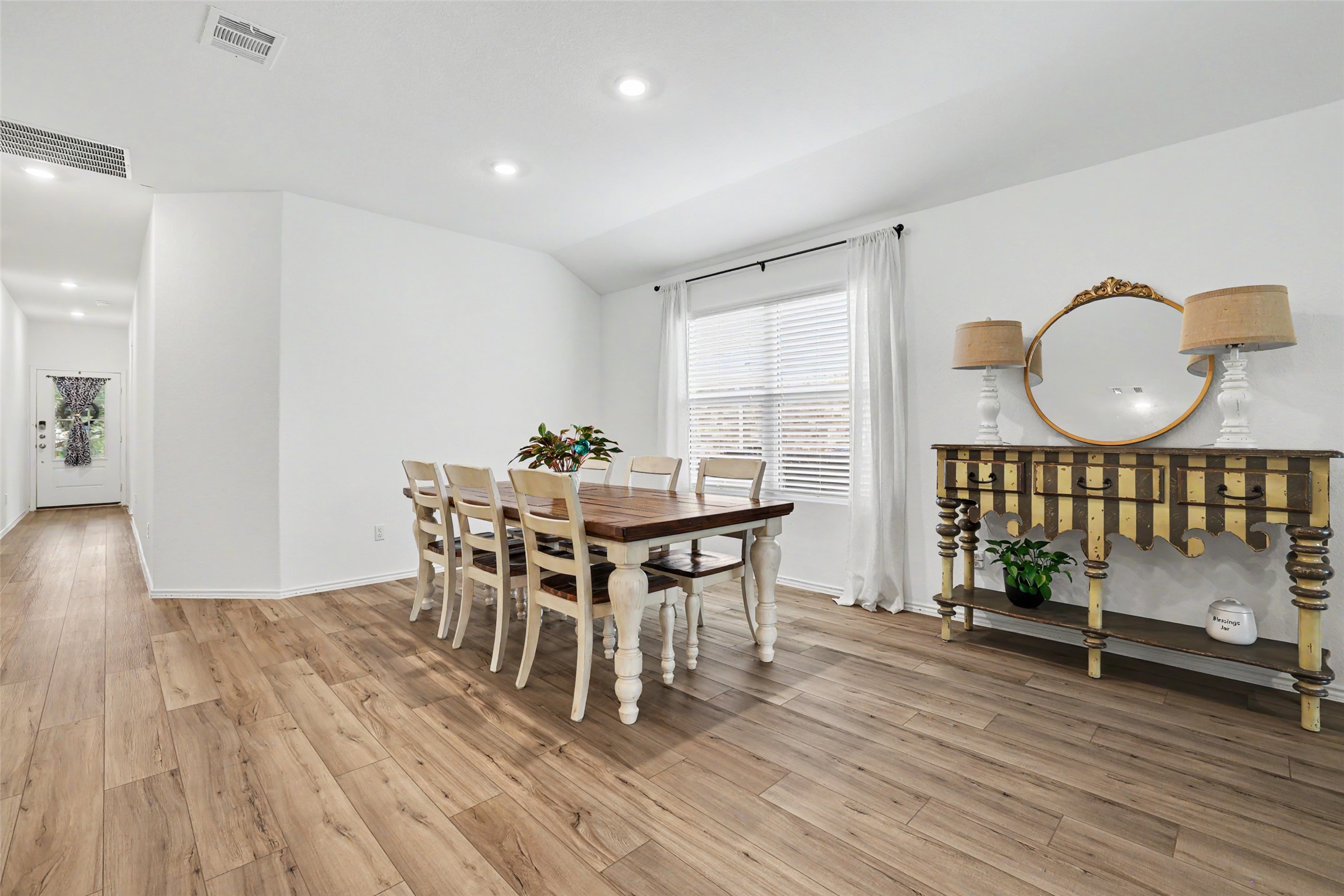 2333 Four Waters Loop Georgetown, TX 78628 - Photo 8 of 35 Spacious interior featuring wood-finish flooring, recessed lighting, and white walls