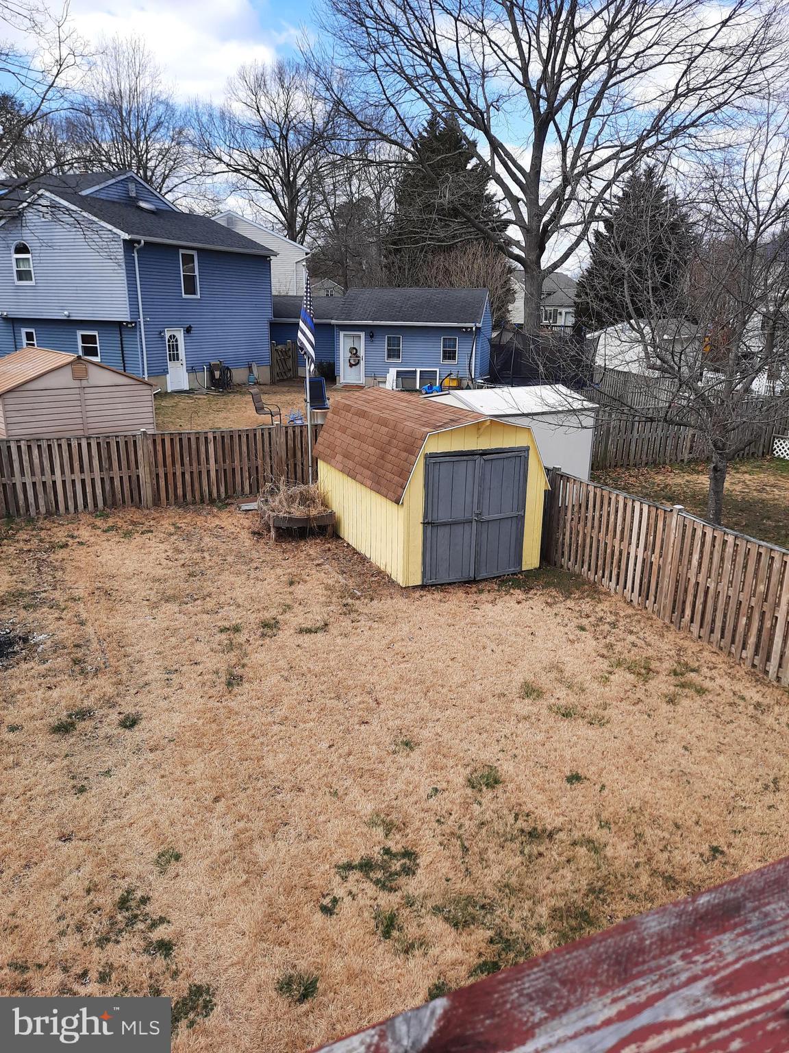 7846 Tick Neck Road Pasadena, MD 21122 - Photo 12 of 22 LARGE FENCED BACK YARD W/ SHED