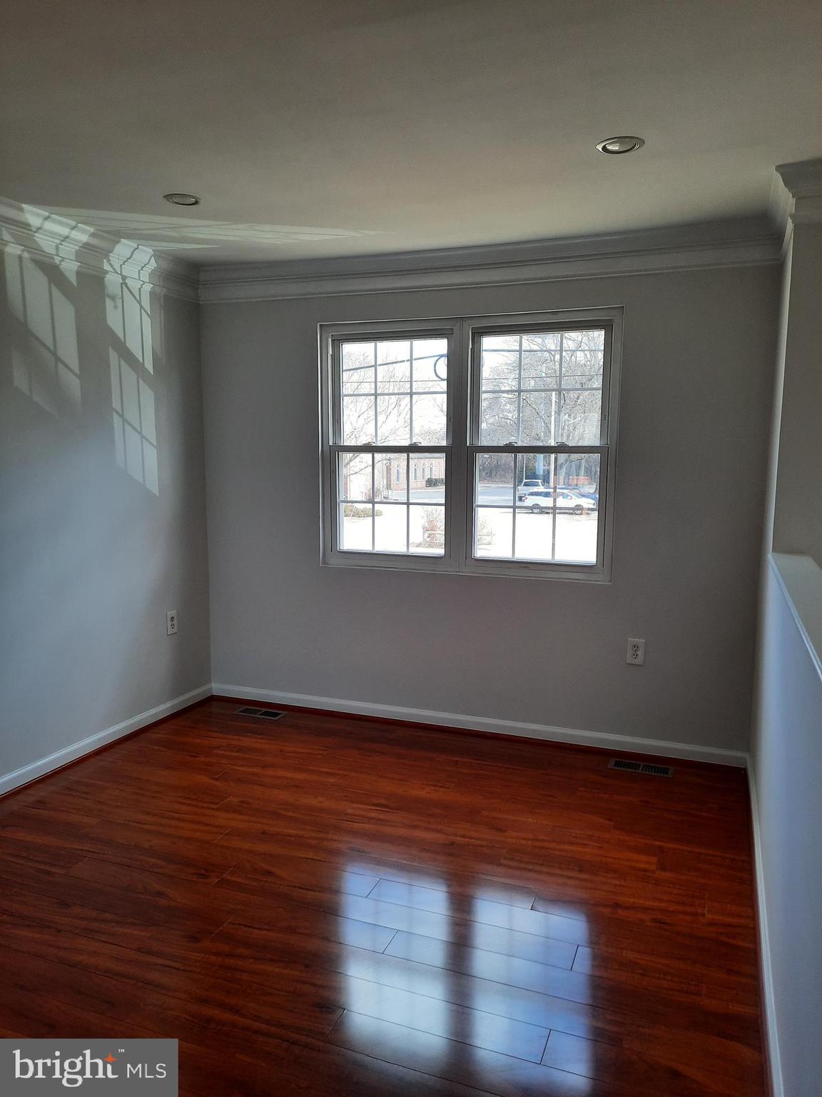 7846 Tick Neck Road Pasadena, MD 21122 - Photo 8 of 22 LIVING ROOM WITH WOOD FLOORING