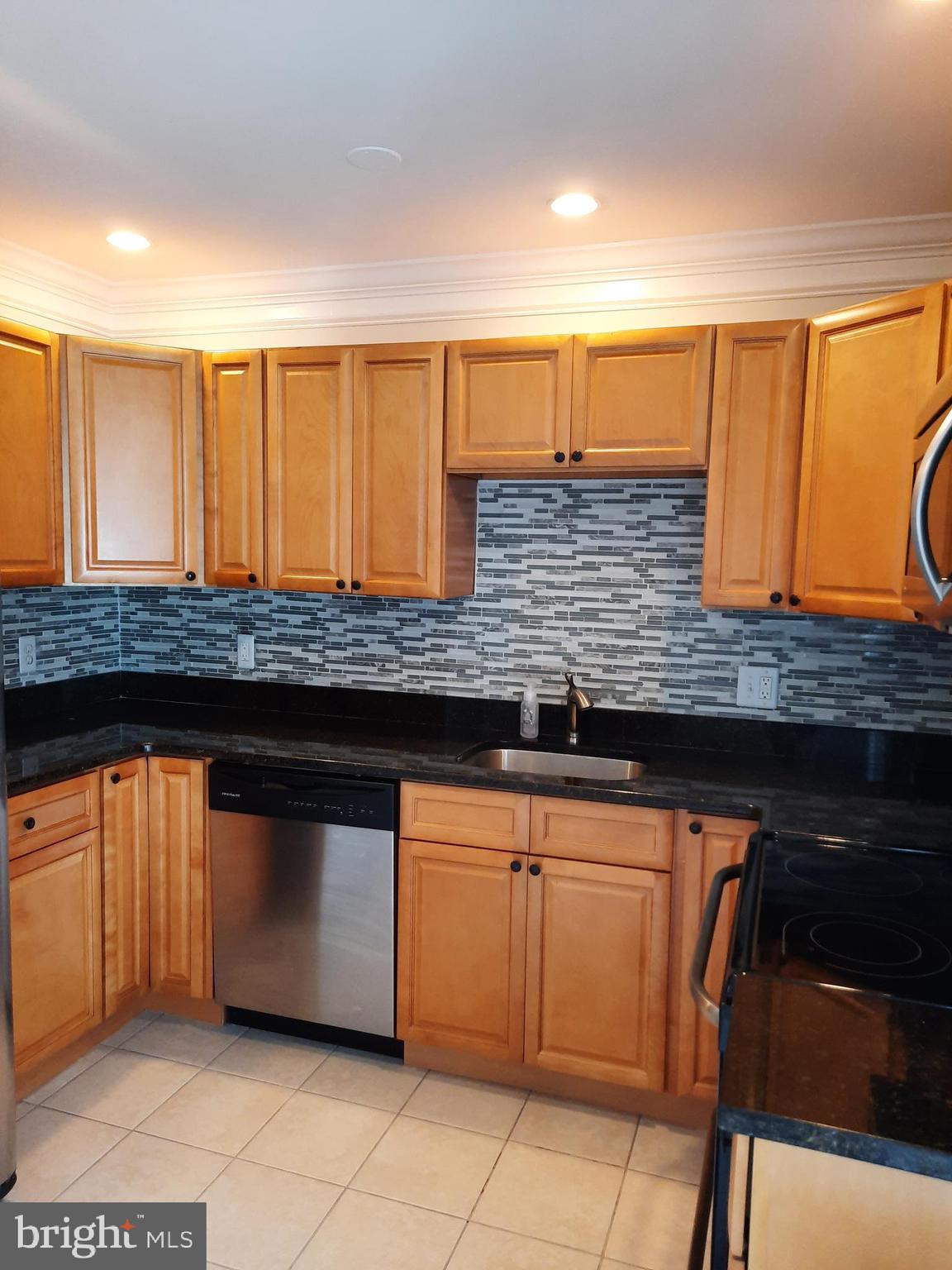 7846 Tick Neck Road Pasadena, MD 21122 - Photo 9 of 22 UPDATED KITCHEN/TILE FLOORING