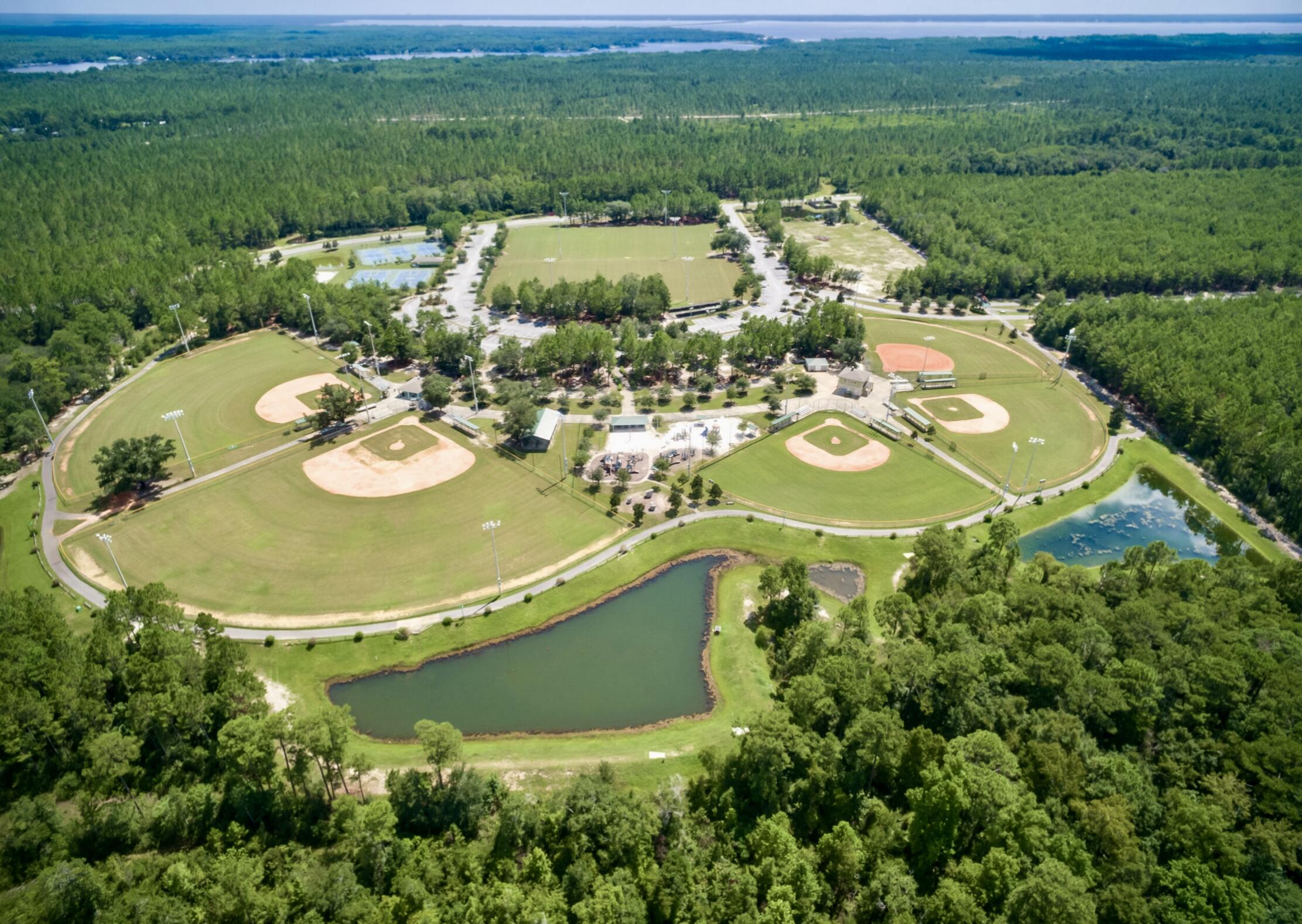 629 Earl Godwin Road Freeport, FL 32439 - Photo 30 of 36 a view of a house with a swimming pool