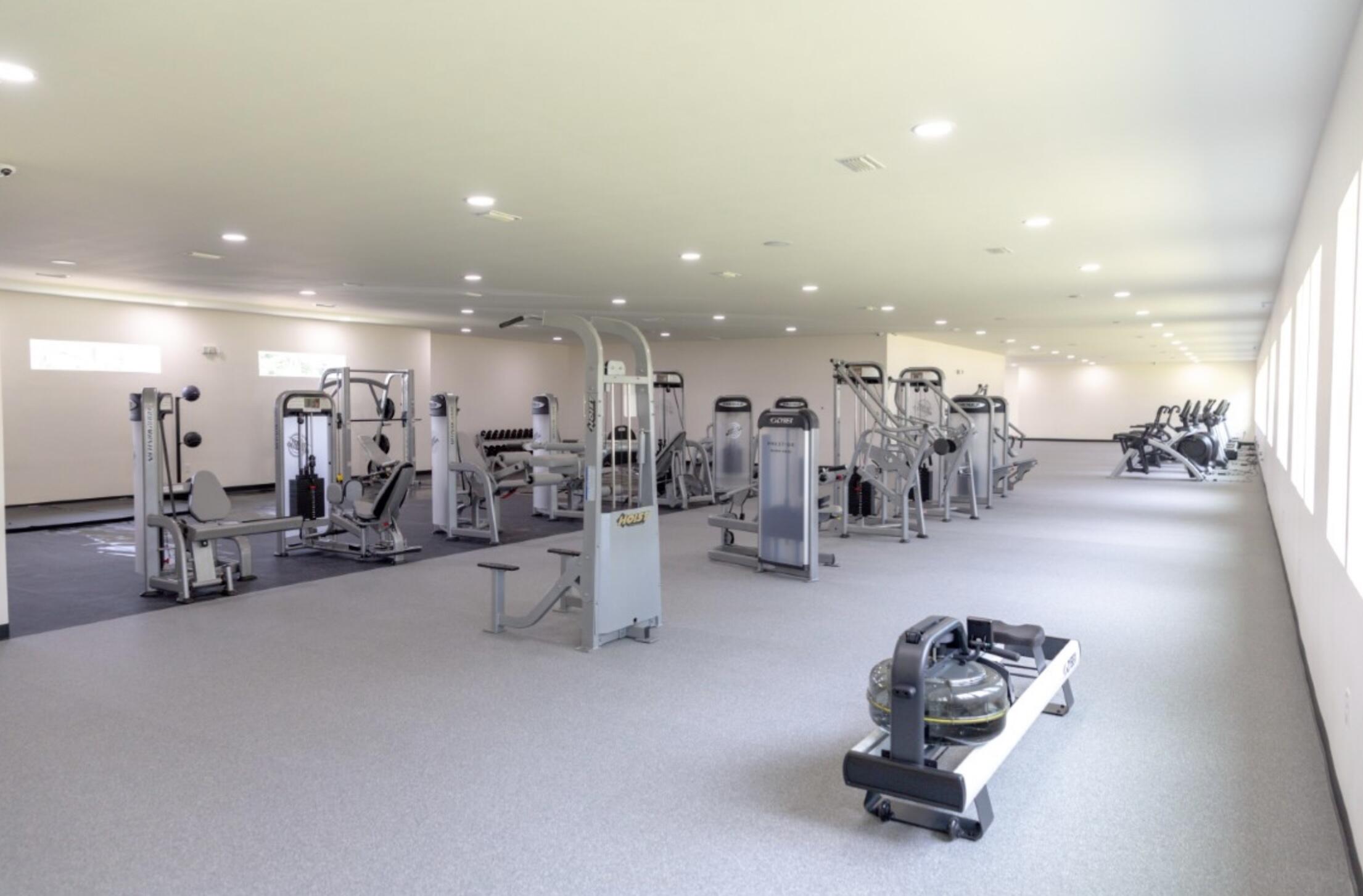 629 Earl Godwin Road Freeport, FL 32439 - Photo 33 of 36 a room with gym equipment and a view of living room