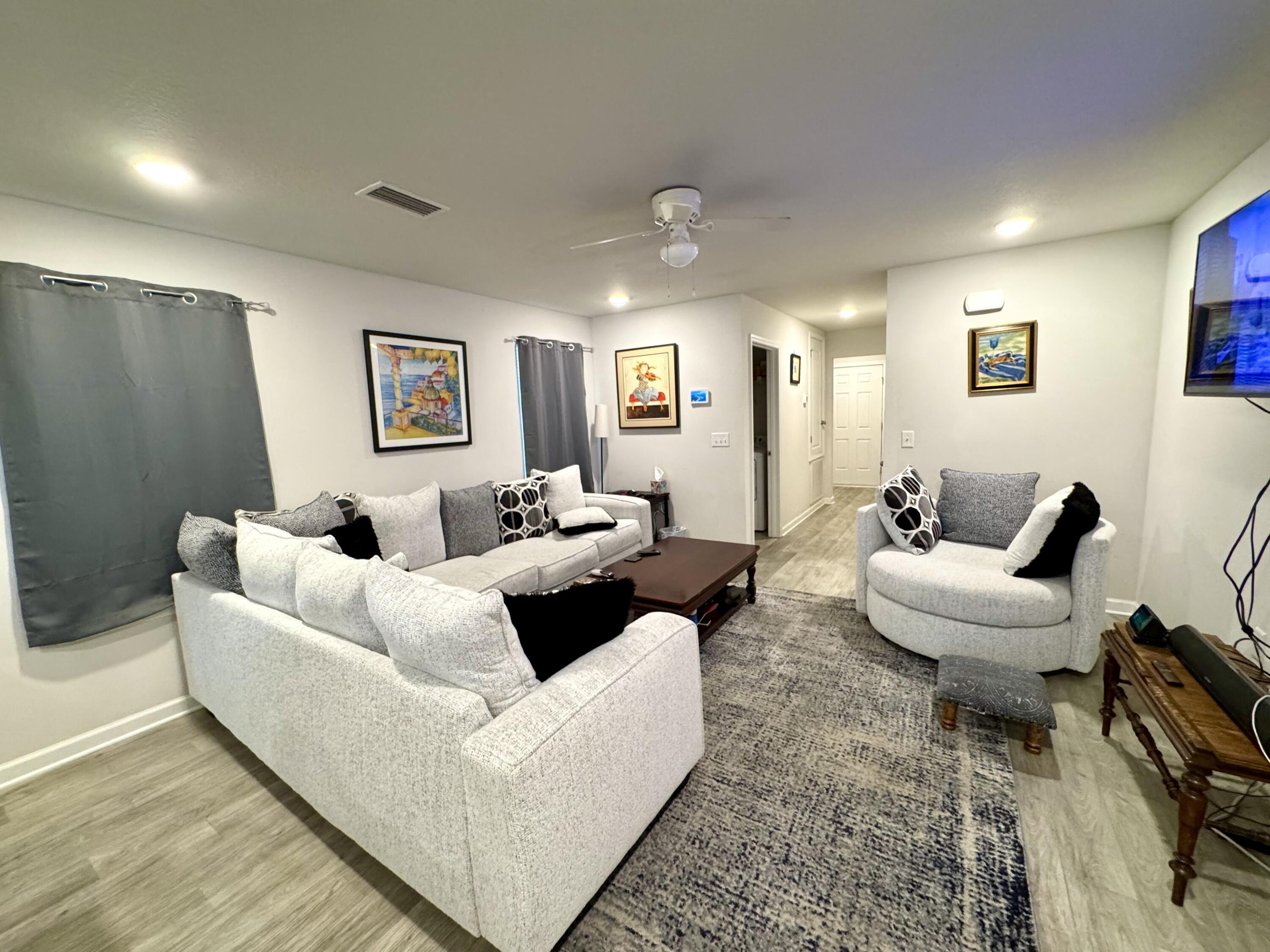 629 Earl Godwin Road Freeport, FL 32439 - Photo 8 of 36 a living room with furniture and a couch