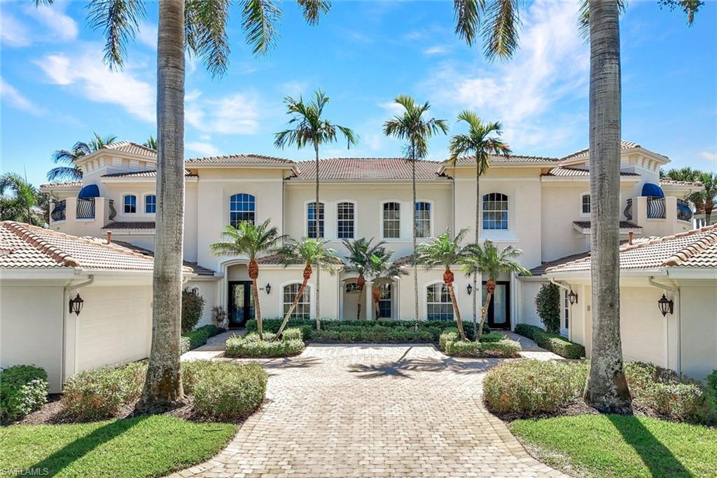 15516 Monterosso Lane, Unit 101 Naples, FL 34110 - Photo 2 of 31 View of front of house featuring stucco siding, decorative driveway, and a tiled roof