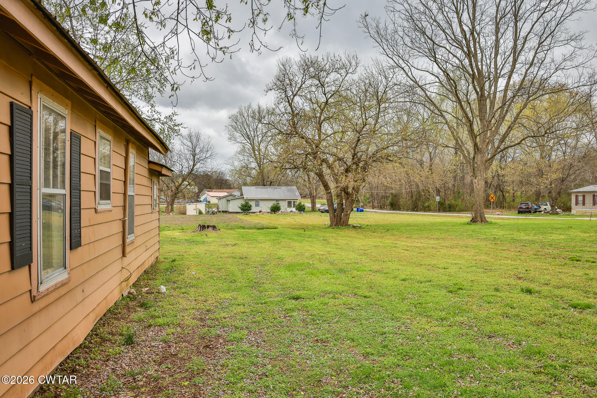 509 North Cedar Street Gleason, TN 38229 - Photo 18 of 26 a view of yard with tree