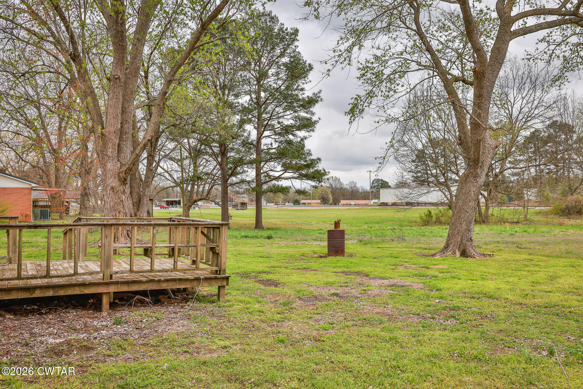 509 North Cedar Street Gleason, TN 38229 - Photo 22 of 26 a backyard of a house with lots of green space
