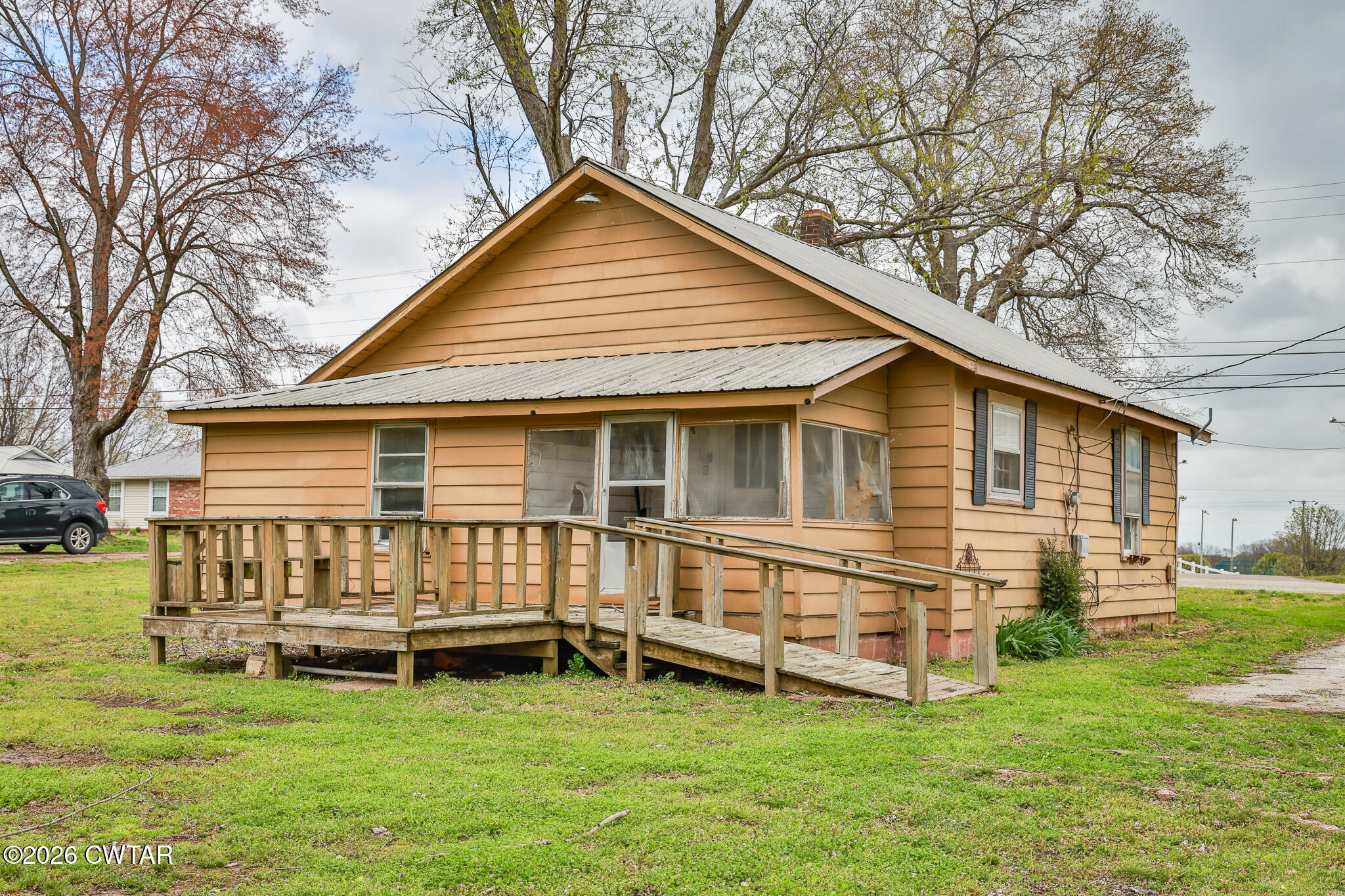 509 North Cedar Street Gleason, TN 38229 - Photo 24 of 26 a view of a house with a yard