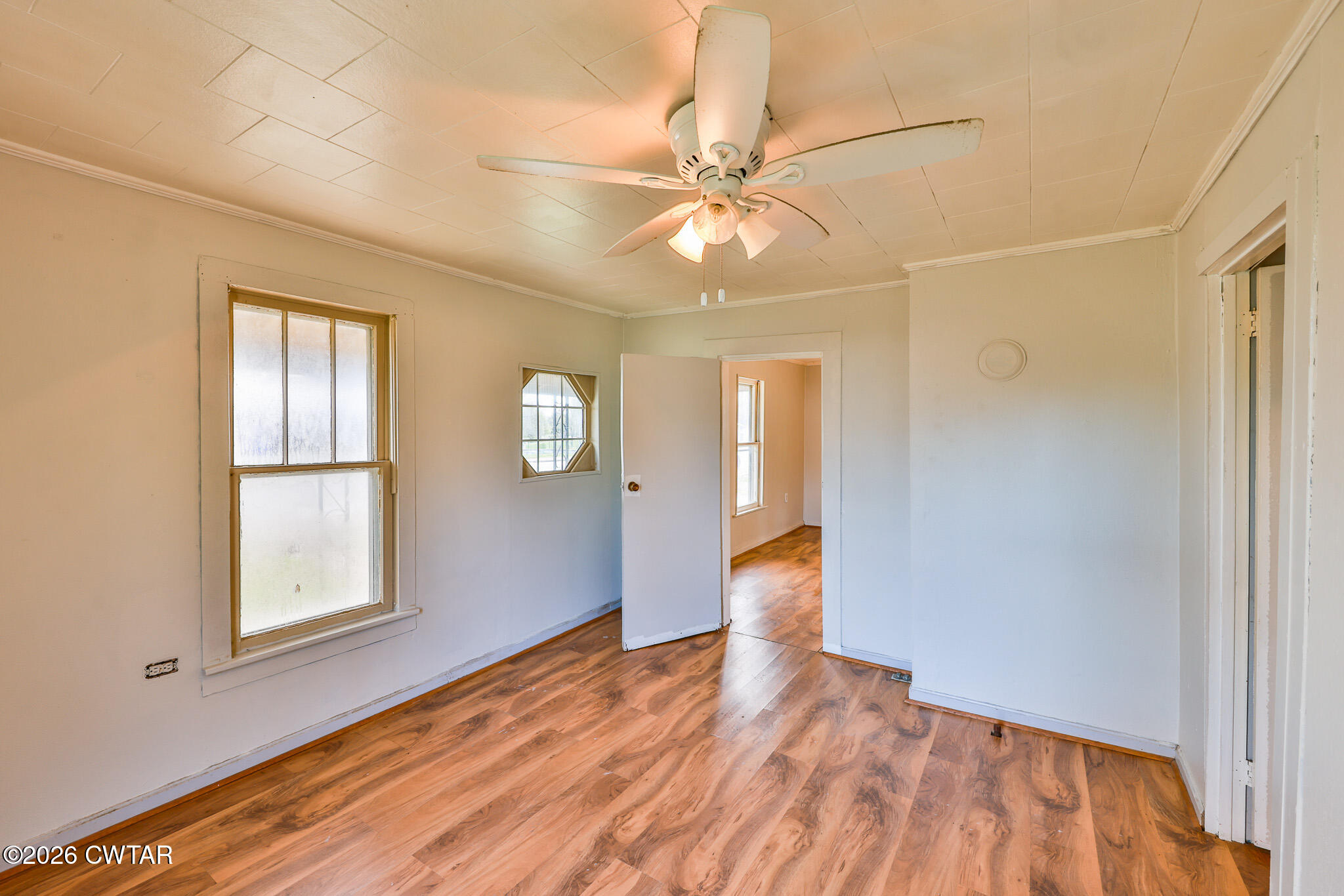 509 North Cedar Street Gleason, TN 38229 - Photo 6 of 26 wooden floor in an empty room with a window