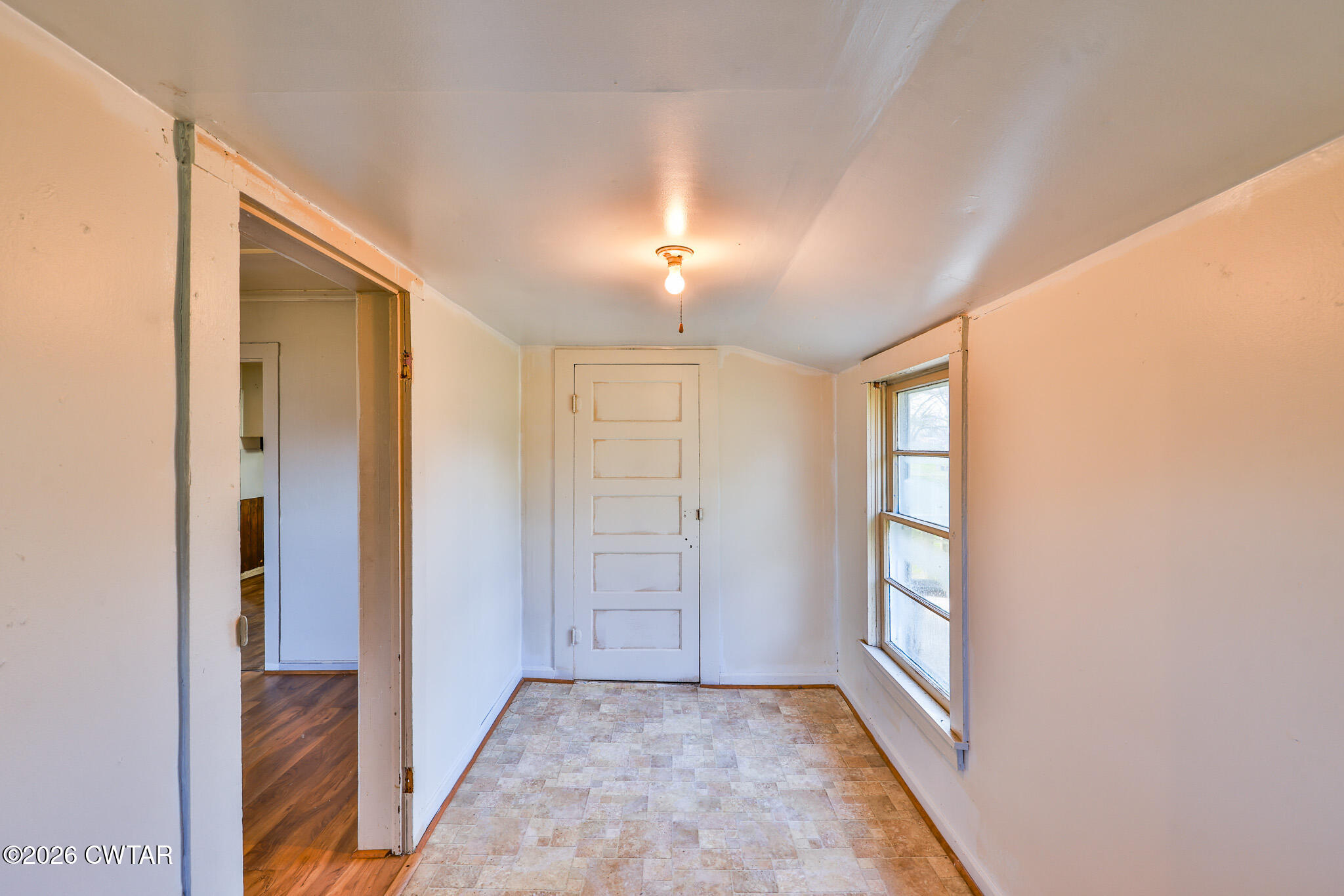 509 North Cedar Street Gleason, TN 38229 - Photo 9 of 26 an empty room with windows and closet