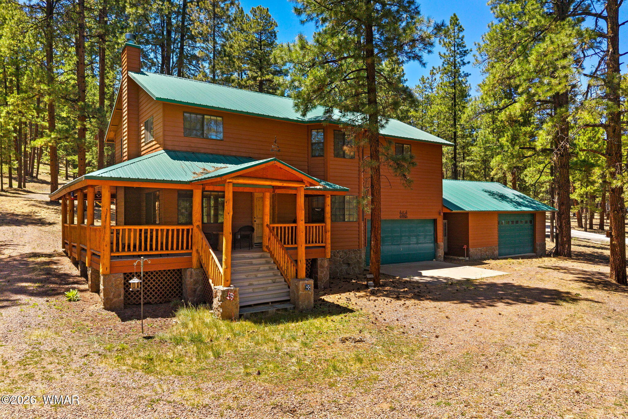 48 North 1068th Street Greer, AZ 85927 - Photo 1 of 37 a front view of a house with a yard