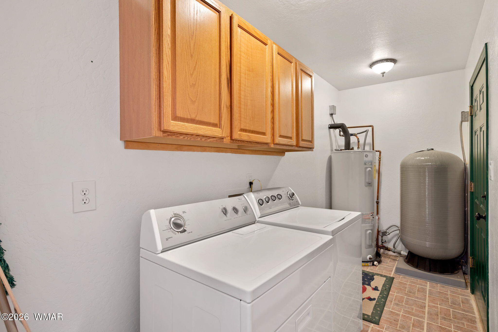 48 North 1068th Street Greer, AZ 85927 - Photo 25 of 37 a utility room with dryer and washer