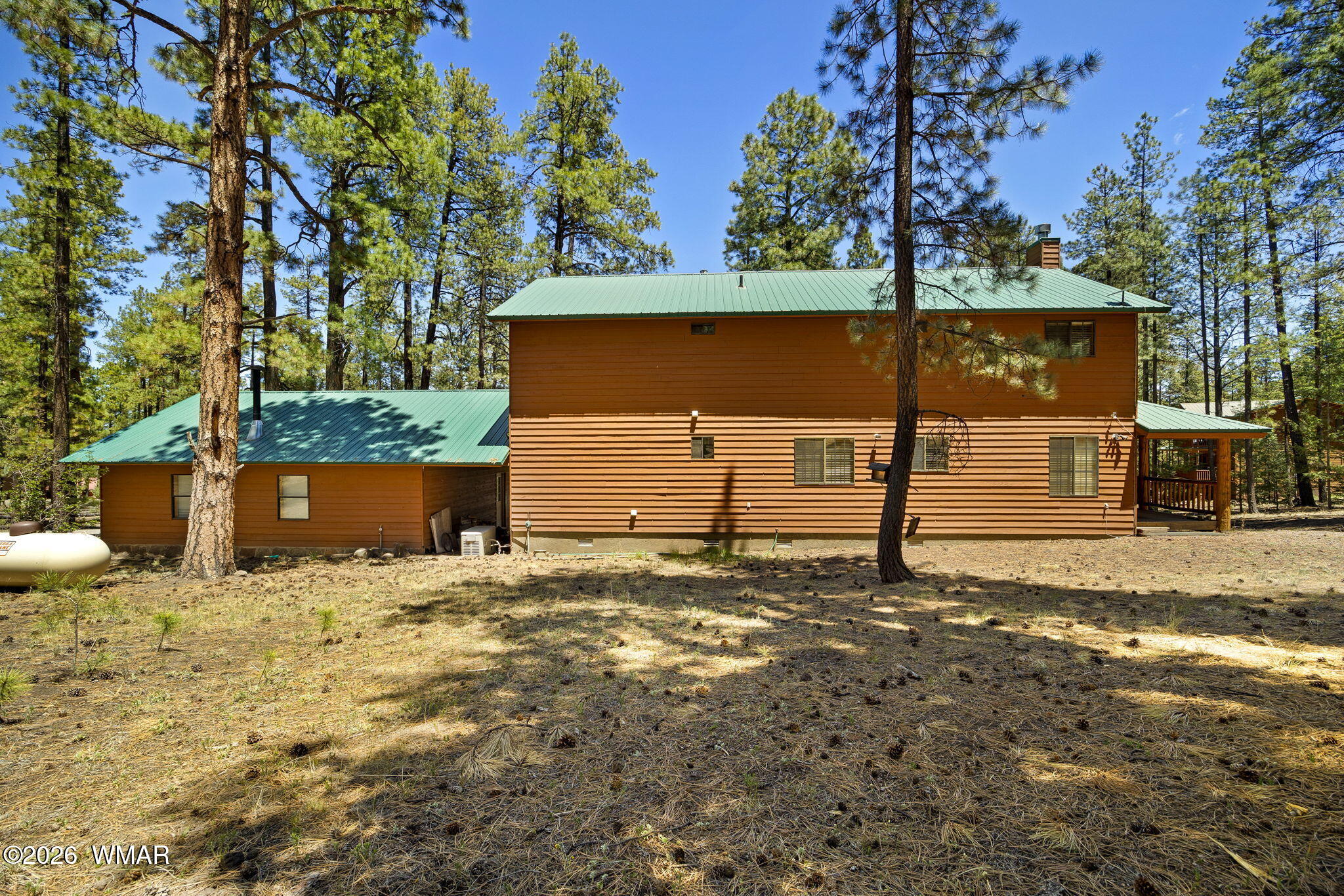 48 North 1068th Street Greer, AZ 85927 - Photo 29 of 37 a view of a house with a yard