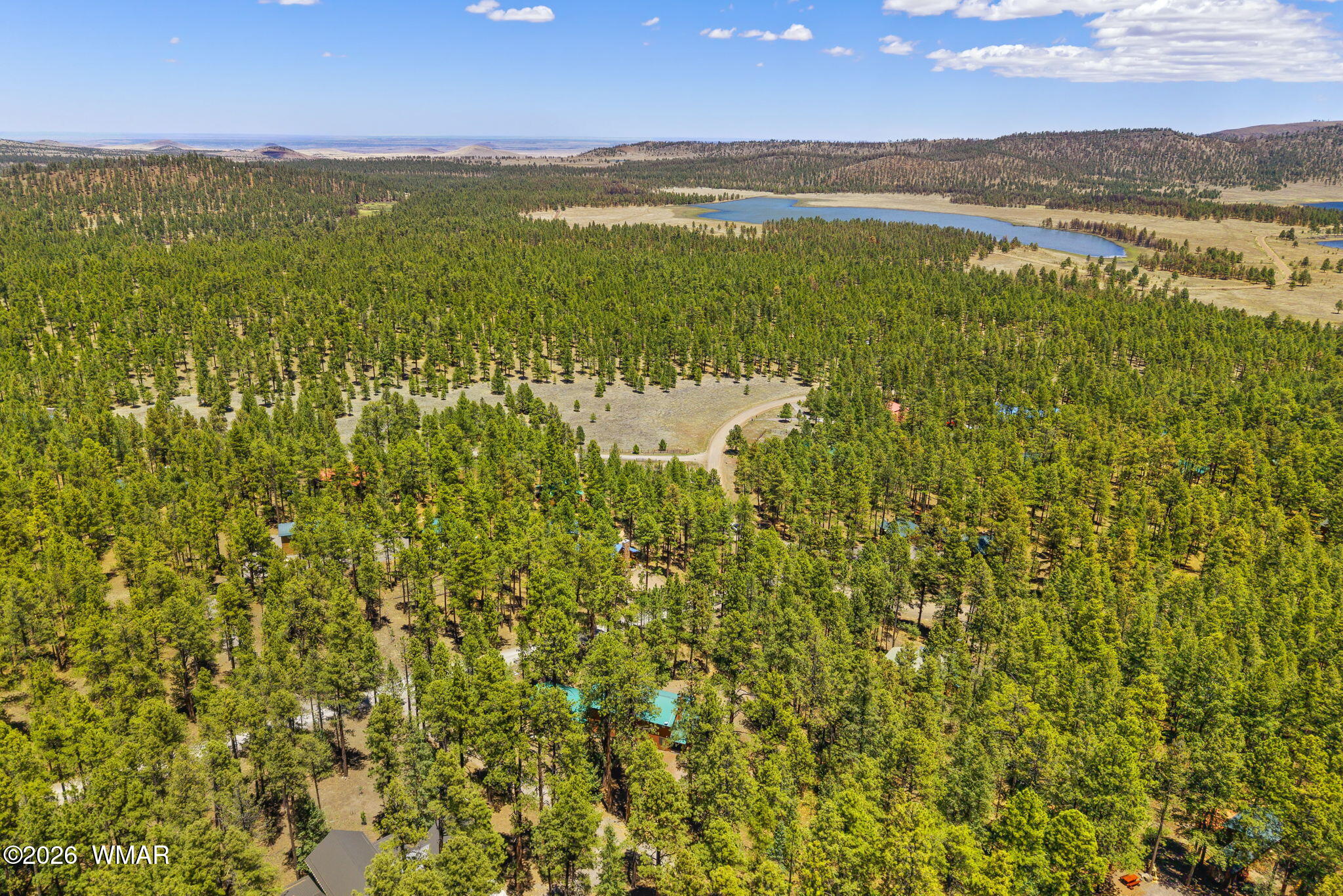 48 North 1068th Street Greer, AZ 85927 - Photo 33 of 37 a view of lake with mountain
