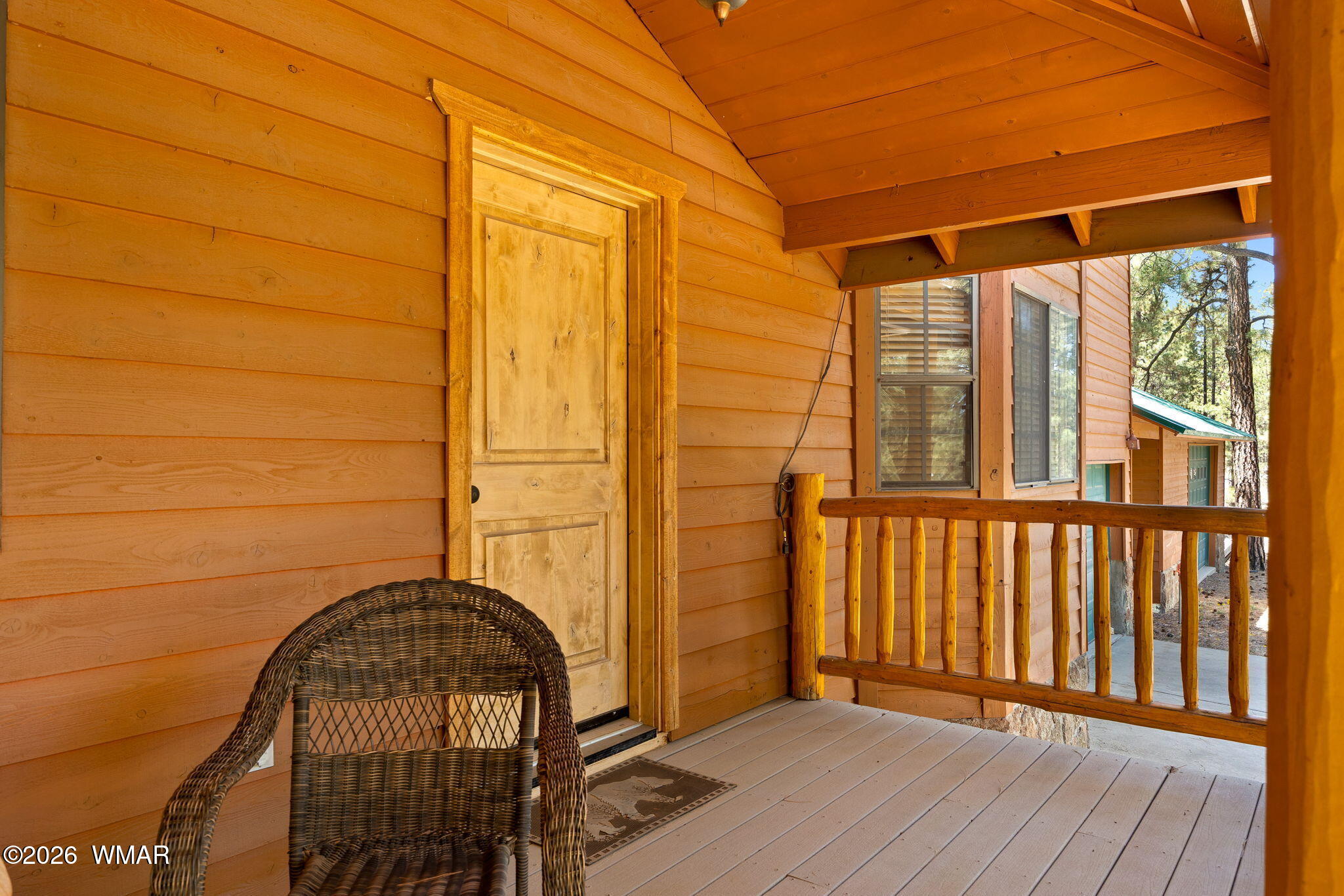 48 North 1068th Street Greer, AZ 85927 - Photo 4 of 37 a view of porch with a door