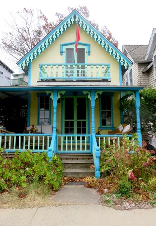 a front view of a house with a porch