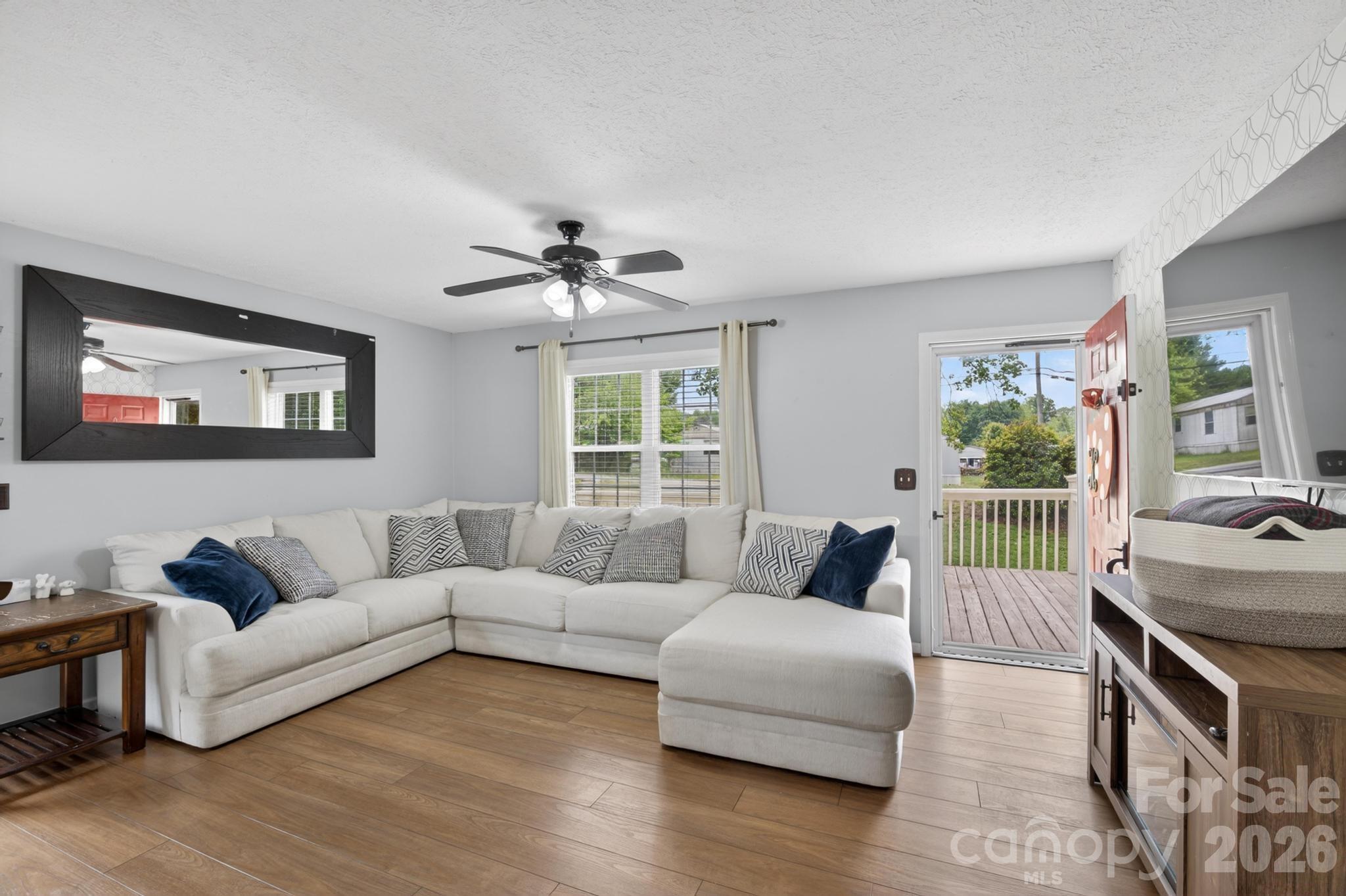 2308 Walt Arney Road Lenoir, NC 28645 - Photo 24 of 37 a living room with furniture and a window