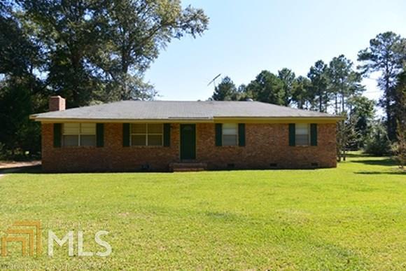 291 Flowing Well Road Leesburg, GA 31763 - Photo 1 of 1 a front view of a house with yard