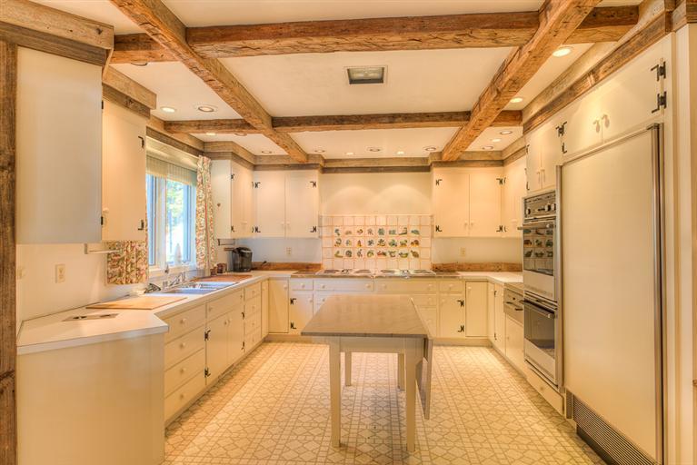 132 Fox Island Road Osterville, MA 02655 - Photo 8 of 24 a large white kitchen with a lot of counter space and a sink