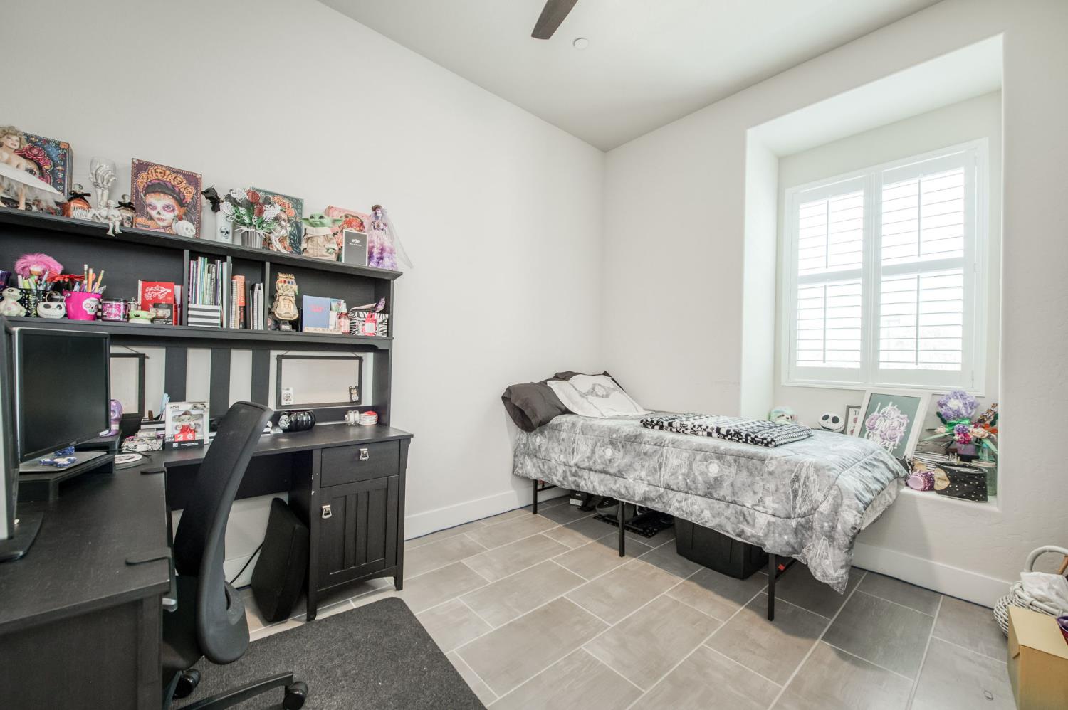 1020 Highland Road Madera, CA 93636 - Photo 22 of 42 a bedroom with furniture and a window