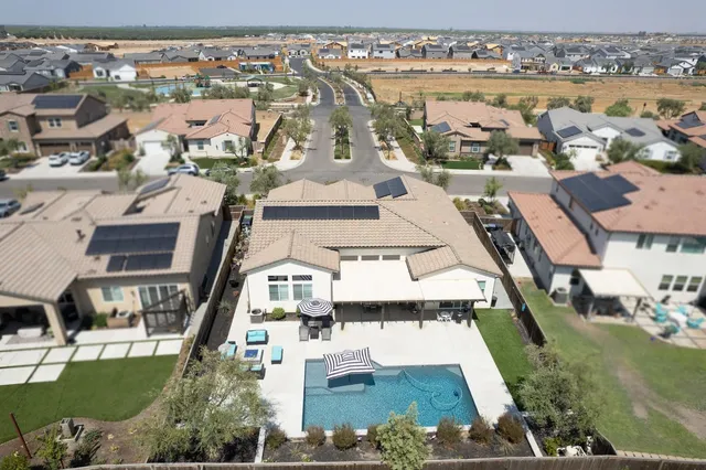 a view of a house with a street