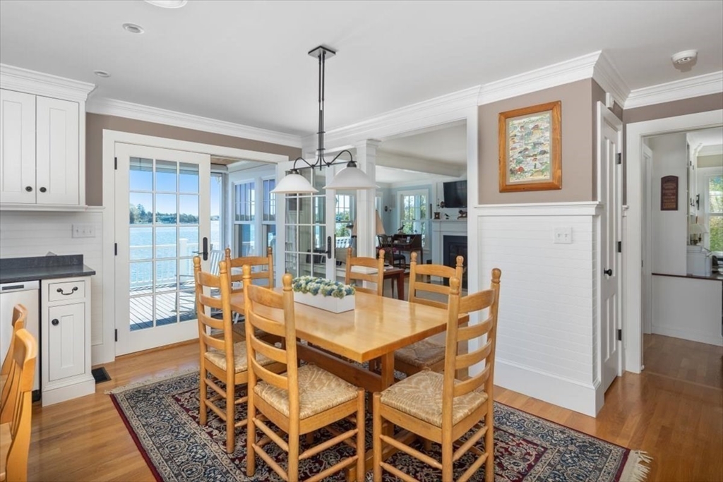 187 Downer Avenue Hingham, MA 02043 - Photo 12 of 42 a view of a dining room with furniture