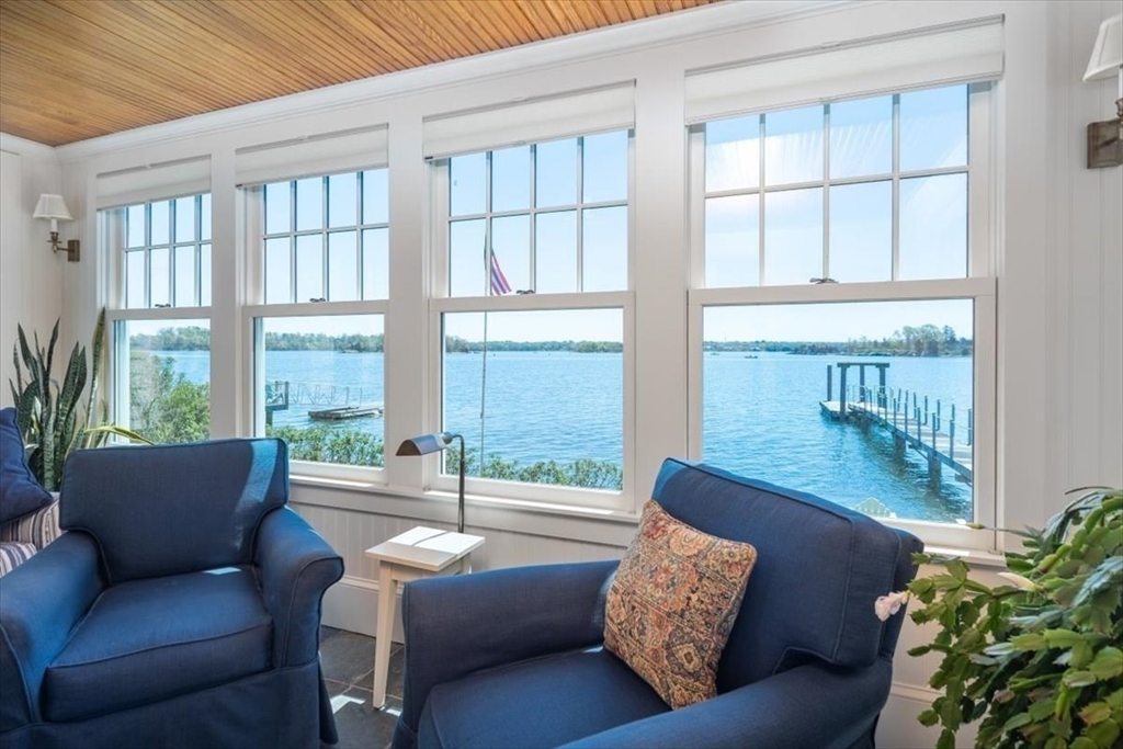187 Downer Avenue Hingham, MA 02043 - Photo 16 of 42 a living room with furniture and a potted plant