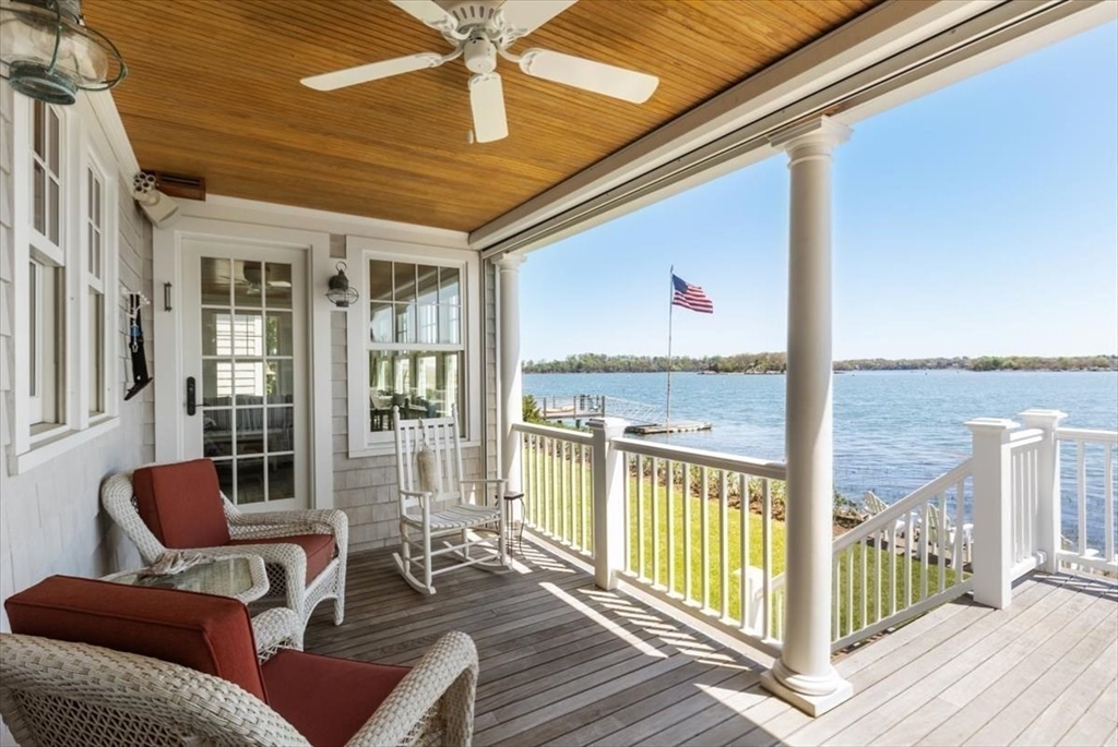187 Downer Avenue Hingham, MA 02043 - Photo 20 of 42 a balcony with furniture and wooden floor