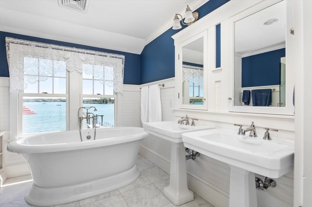 187 Downer Avenue Hingham, MA 02043 - Photo 30 of 42 a bathroom with a bathtub and a sink