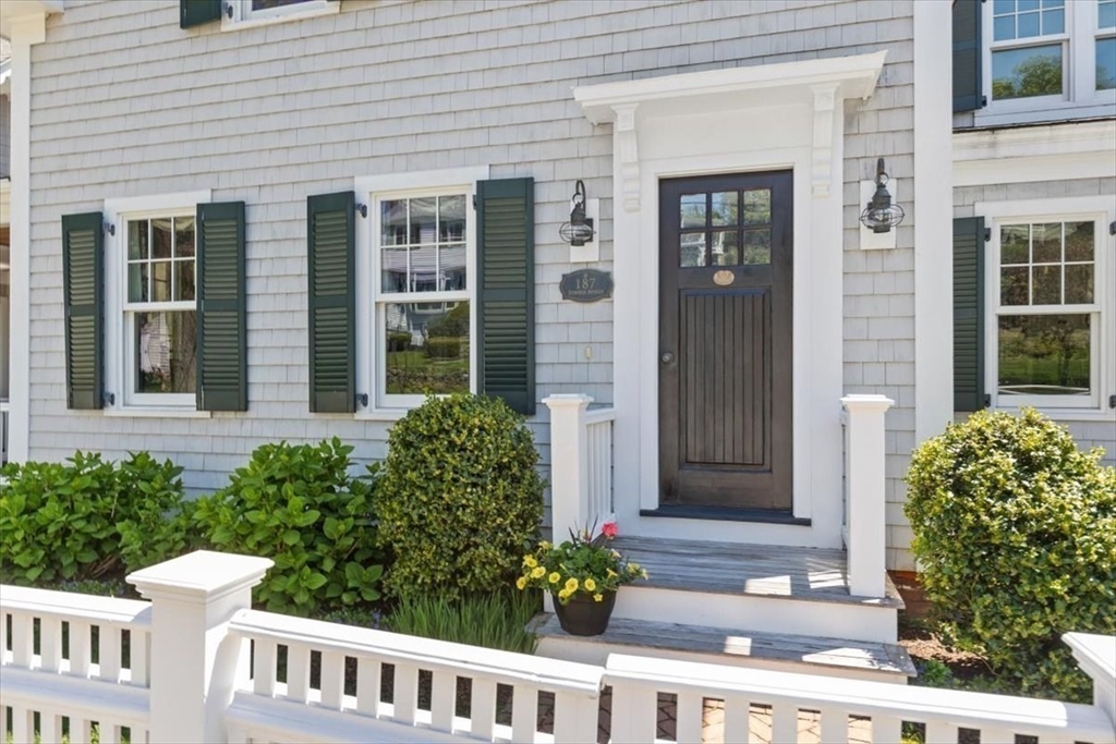 187 Downer Avenue Hingham, MA 02043 - Photo 3 of 42 a front view of a house with a yard