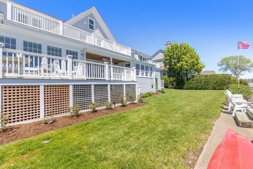 187 Downer Avenue Hingham, MA 02043 - Photo 36 of 42 a front view of a house with a yard