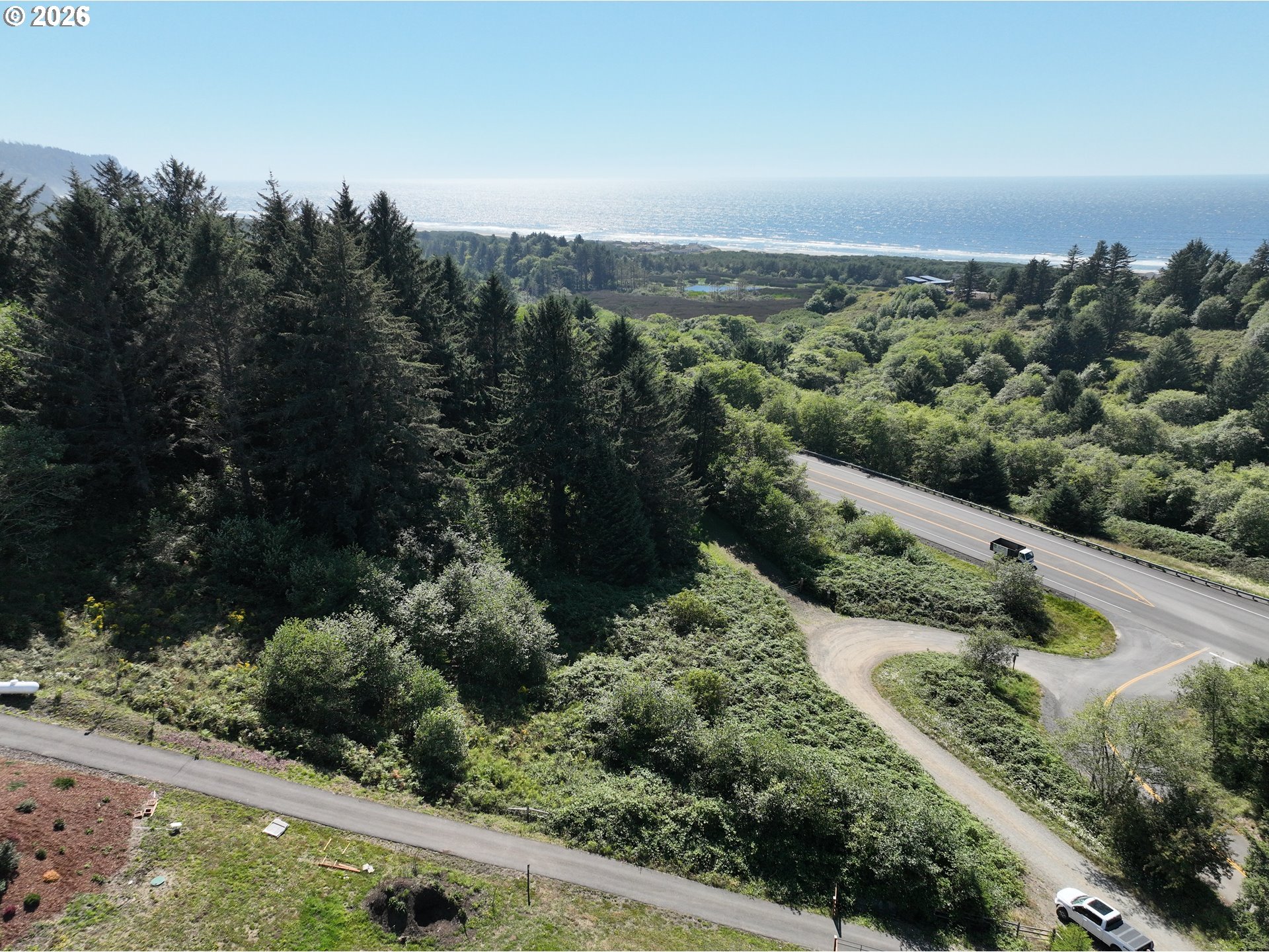 Scherzinger Road Neskowin, OR 97149 - Photo 2 of 8 an aerial view of a city with lots of residential buildings