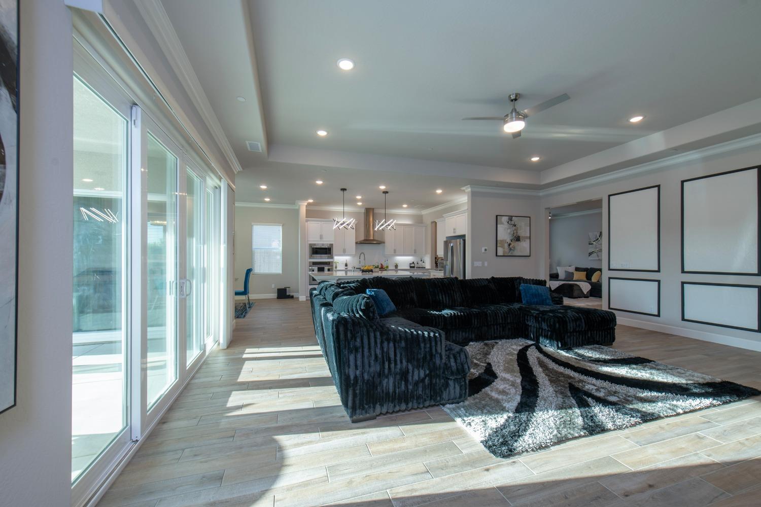 2120 North Perry Avenue Clovis, CA 93619 - Photo 19 of 37 a living room with furniture and a large window