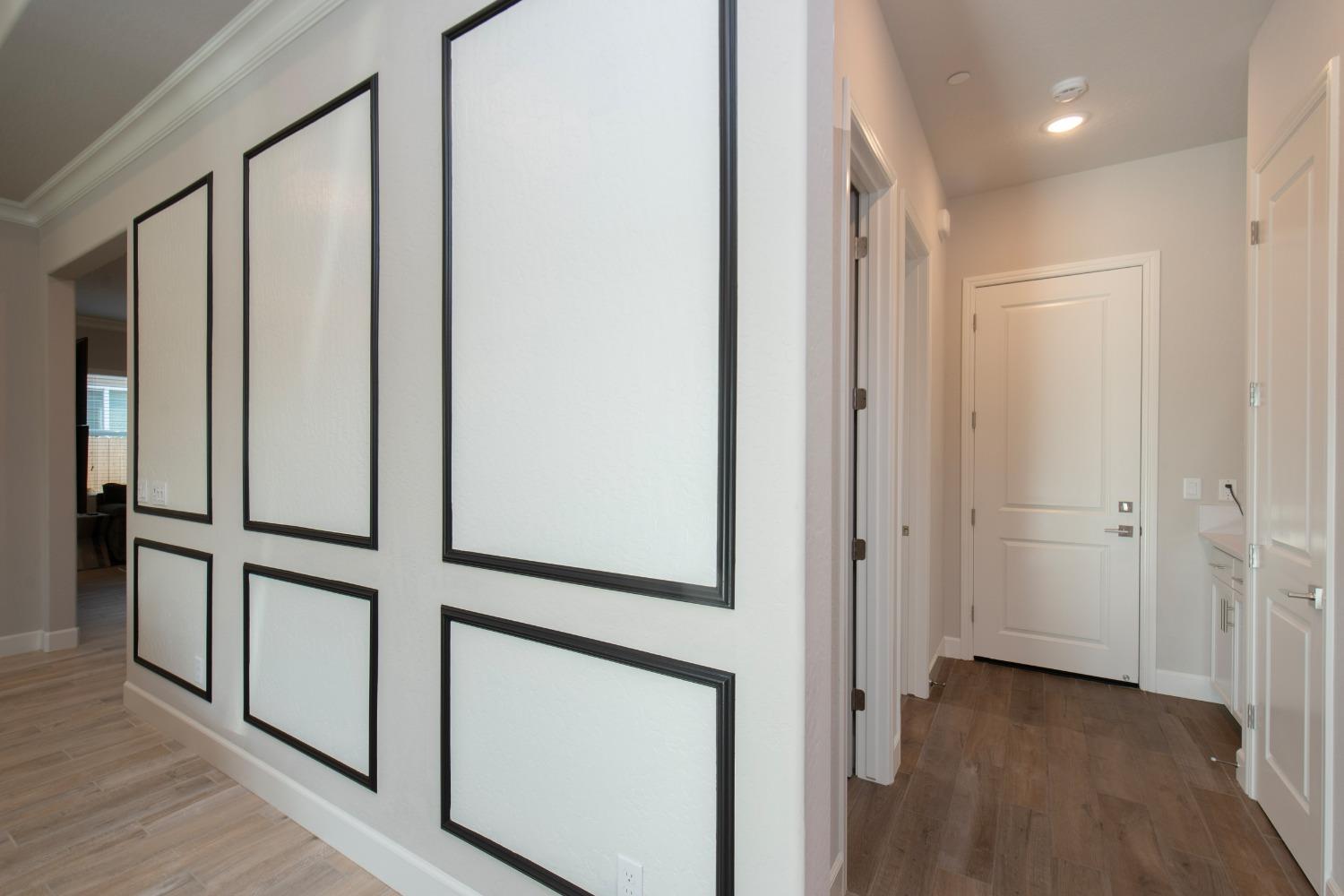 2120 North Perry Avenue Clovis, CA 93619 - Photo 20 of 37 a view of a hallway with wooden floor