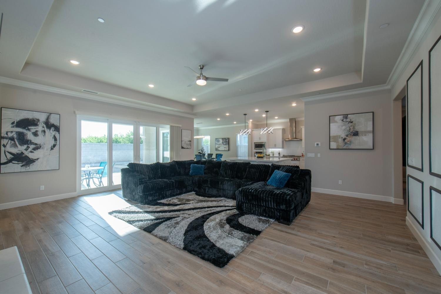 2120 North Perry Avenue Clovis, CA 93619 - Photo 2 of 37 a living room with furniture and a large window