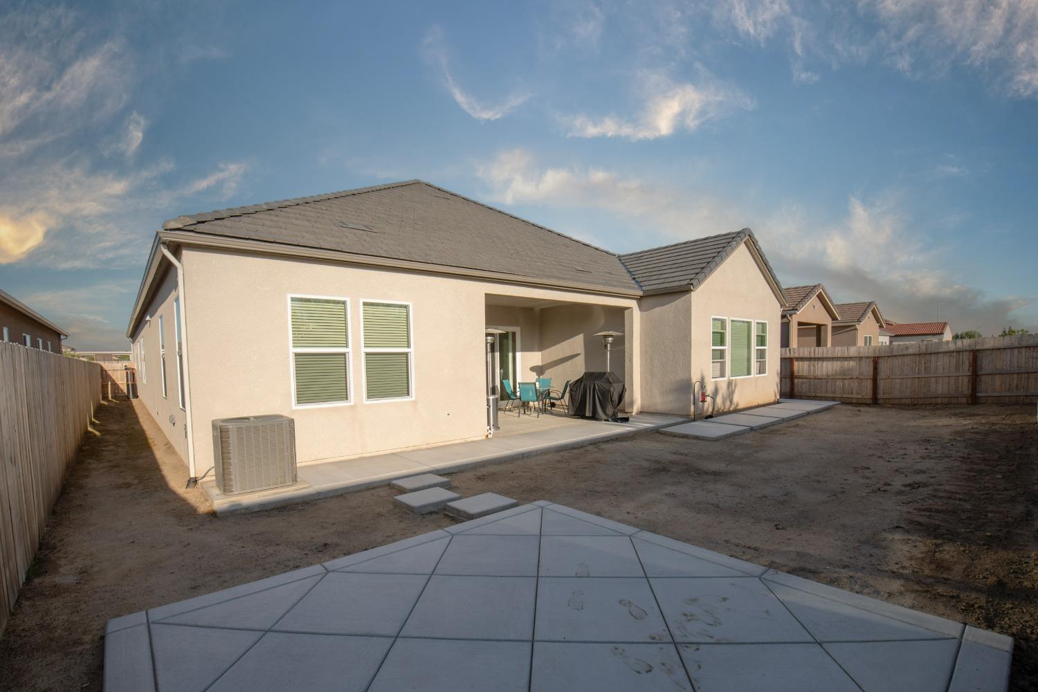 2120 North Perry Avenue Clovis, CA 93619 - Photo 32 of 37 a front view of a house with a garage