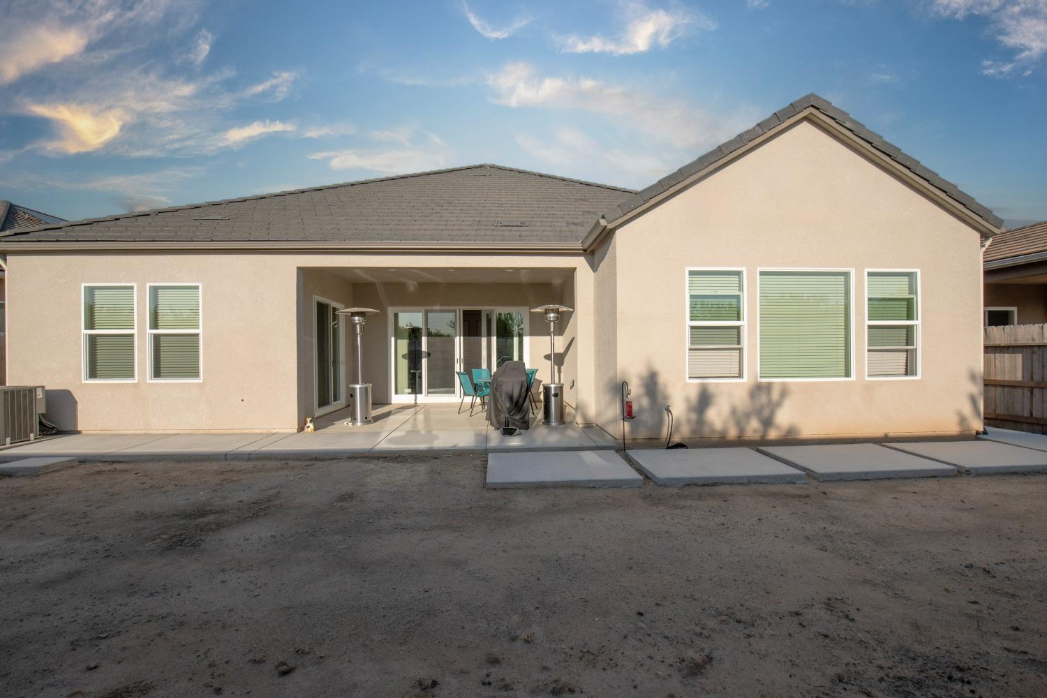 2120 North Perry Avenue Clovis, CA 93619 - Photo 33 of 37 a view of house with backyard and porch