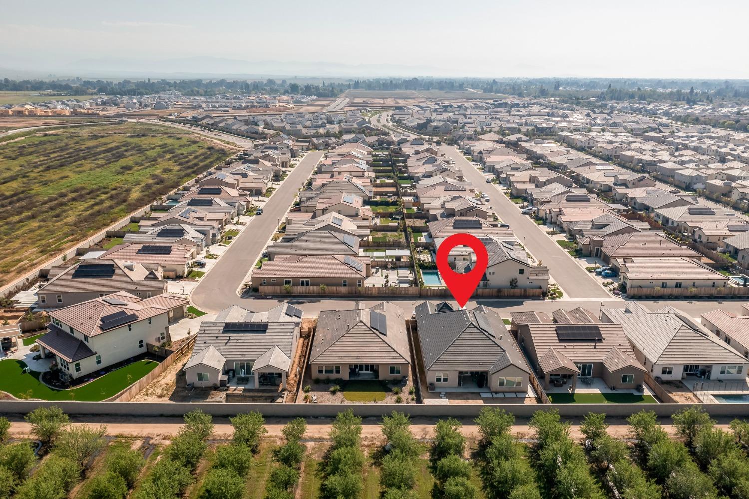 2120 North Perry Avenue Clovis, CA 93619 - Photo 37 of 37 an aerial view of residential houses with outdoor space and swimming pool