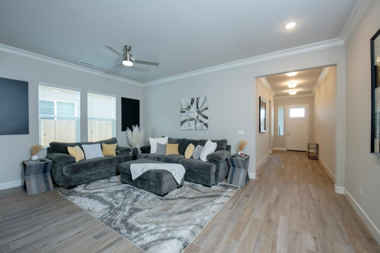 2120 North Perry Avenue Clovis, CA 93619 - Photo 9 of 37 a living room with furniture and wooden floor