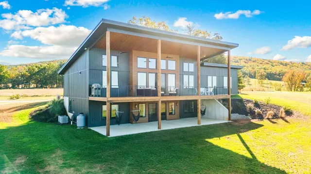 a view of swimming pool with seating space