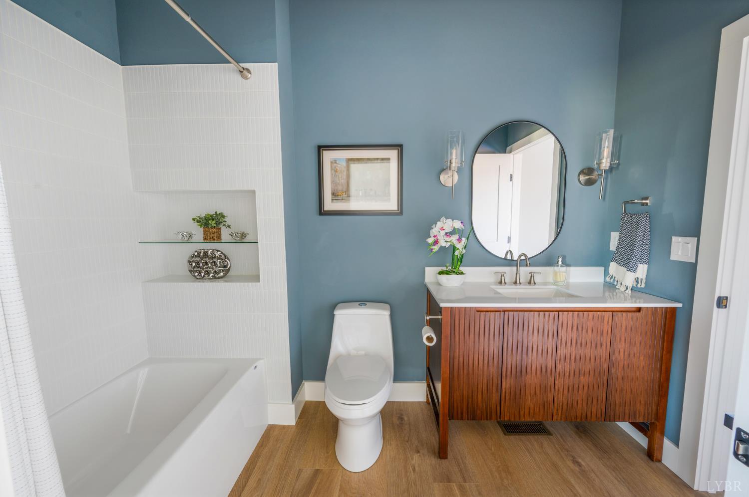 197 Cricket Lane Rustburg, VA 24588 - Photo 26 of 38 a bathroom with a toilet a sink and bathtub