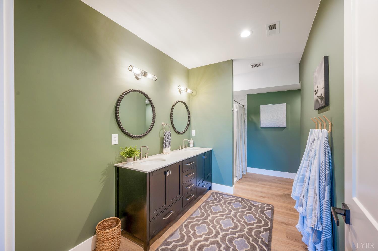 197 Cricket Lane Rustburg, VA 24588 - Photo 29 of 38 a bathroom with a sink mirror and vanity