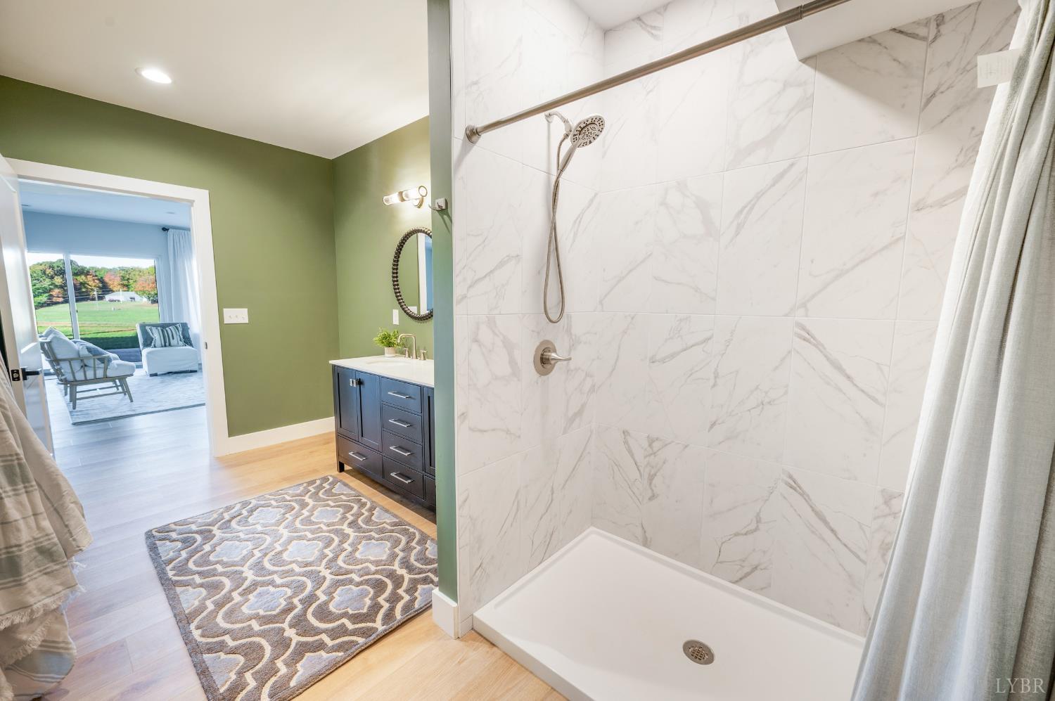 197 Cricket Lane Rustburg, VA 24588 - Photo 30 of 38 a bathroom with a tub a sink and a mirror