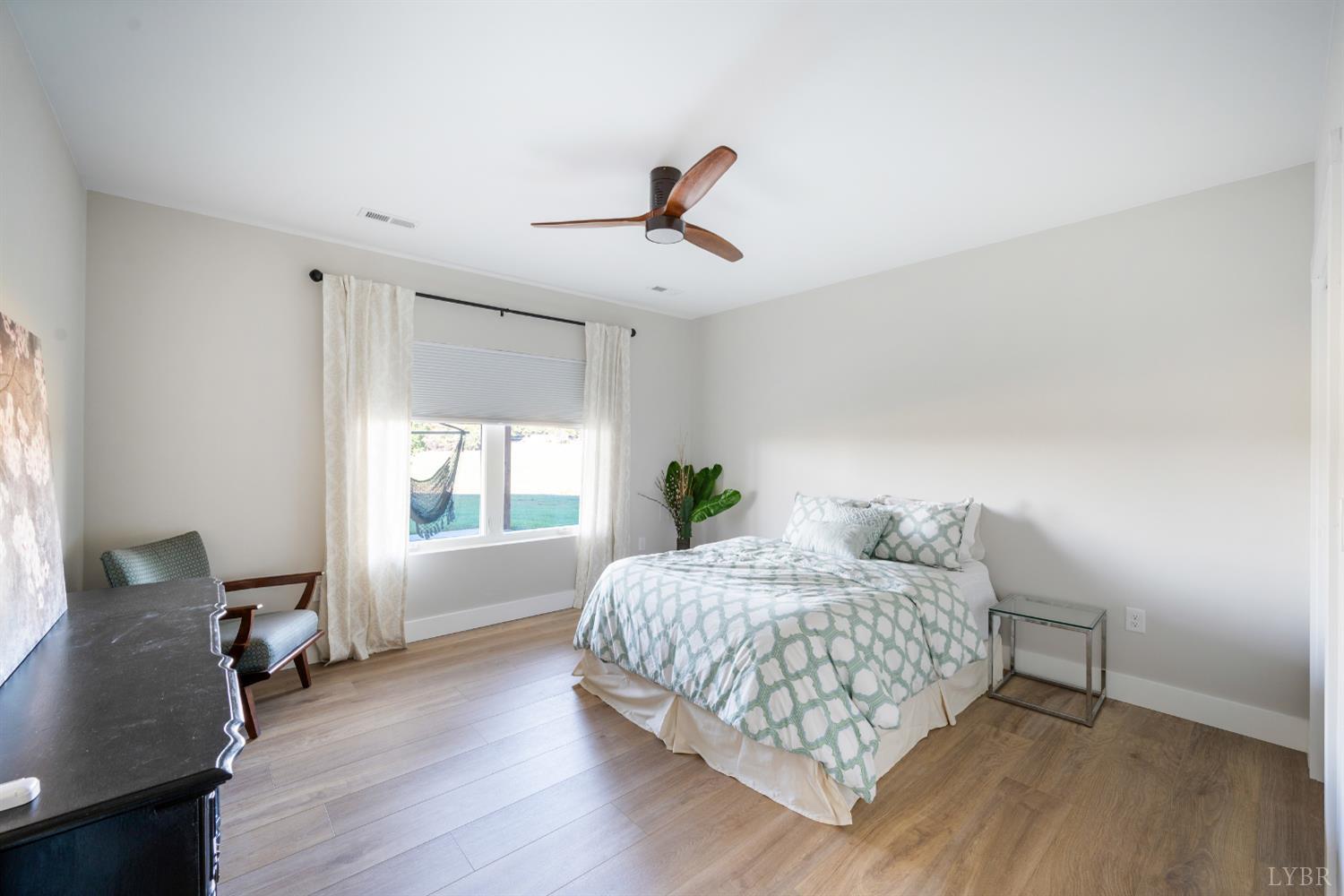 197 Cricket Lane Rustburg, VA 24588 - Photo 33 of 38 a bedroom with a bed and window