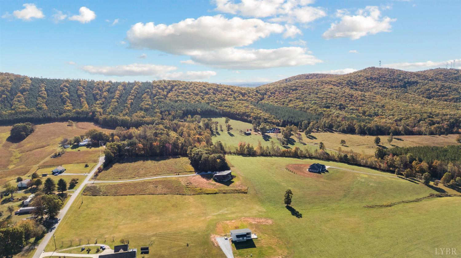 197 Cricket Lane Rustburg, VA 24588 - Photo 7 of 38 a view of a swimming pool and mountain