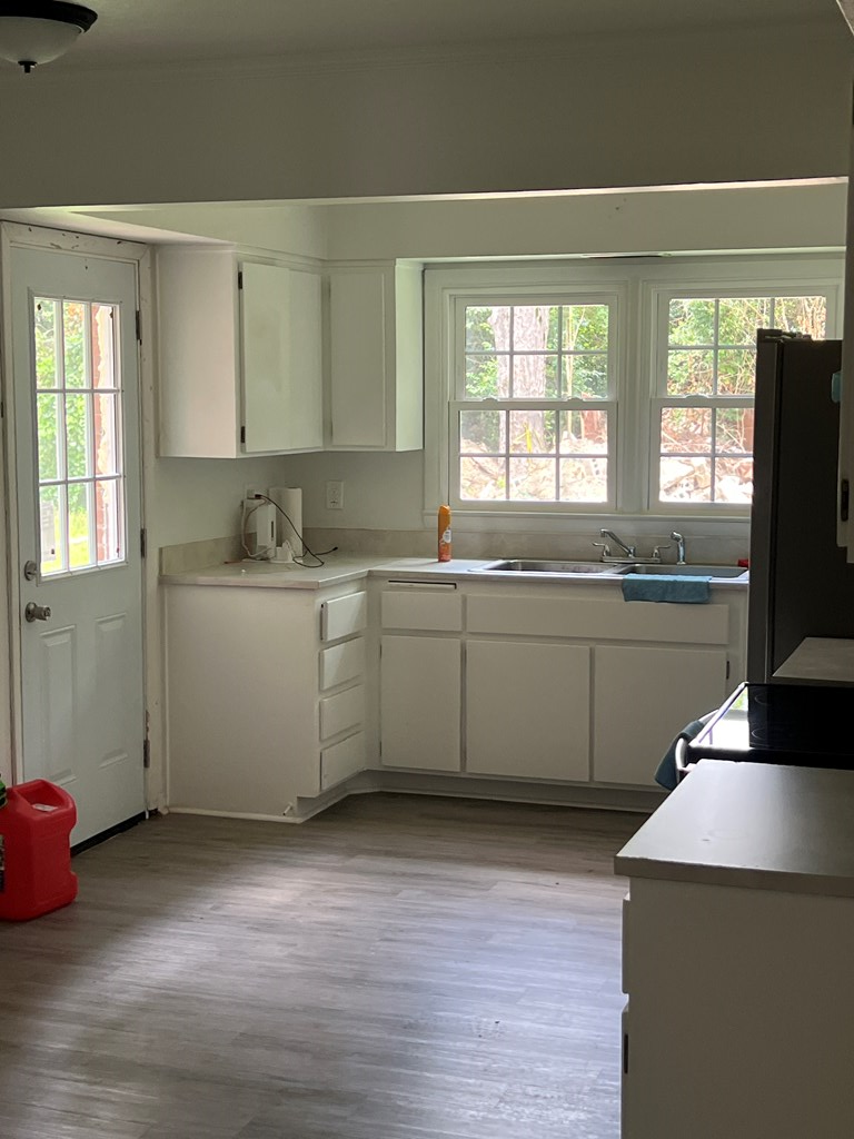 2211 8th Street Columbus, GA 31906 - Photo 6 of 16 kitchen with exterior door easy access to the larg