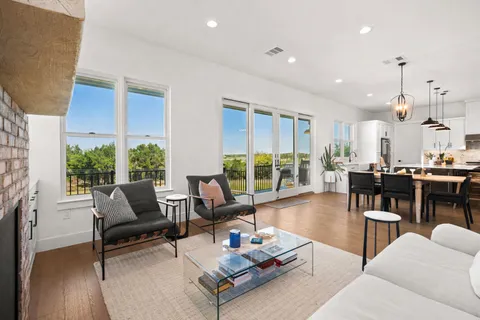 a large kitchen with stainless steel appliances kitchen island a large island in the center