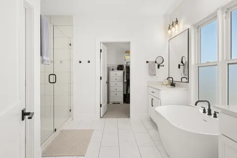 a bed room with a bed and a tv