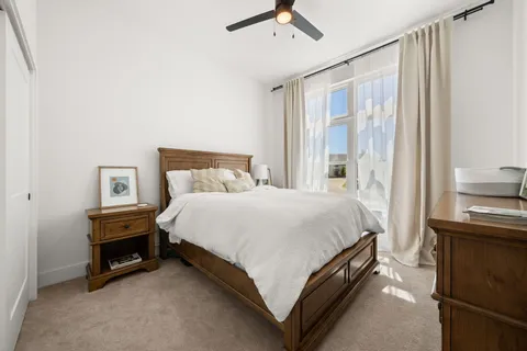 a bathroom with a double vanity sink mirror and toilet