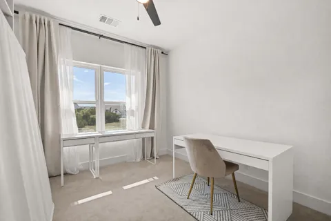 a view of house with a yard table and chairs