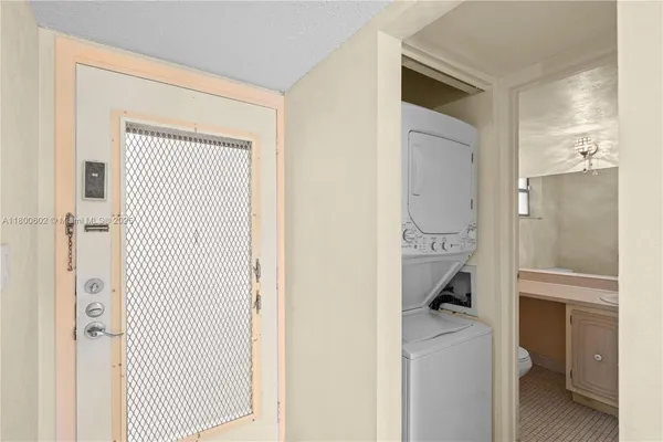 a bedroom with a large bed and a couch